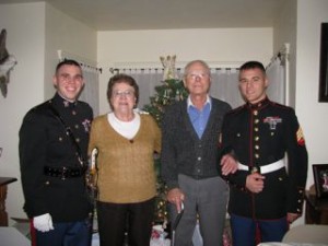 Second Lieutenant Kevin Castle (left) and Sergeant Keith Castle (right) pose with their grandparents, Elizabeth and Edward Drzewiecki (himself a Korean War veteran).