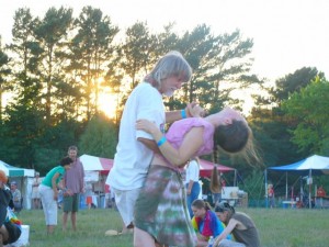 dunegrass10-2006 Local dance instructor Mykl Werth dips his partner during an early Dunegrass Festival.